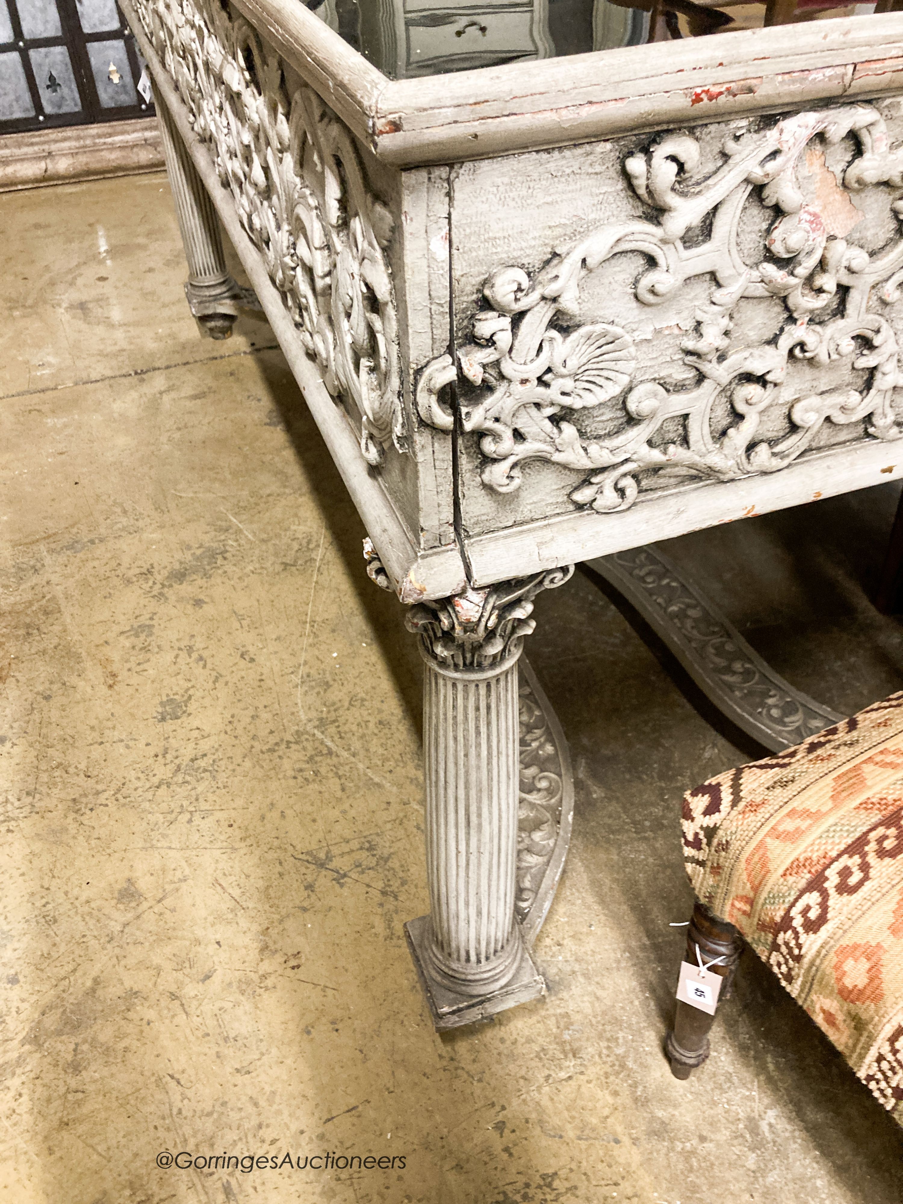 An 18th century style painted two drawer glass top console table, width 180cm, depth 73cm, height 95cm